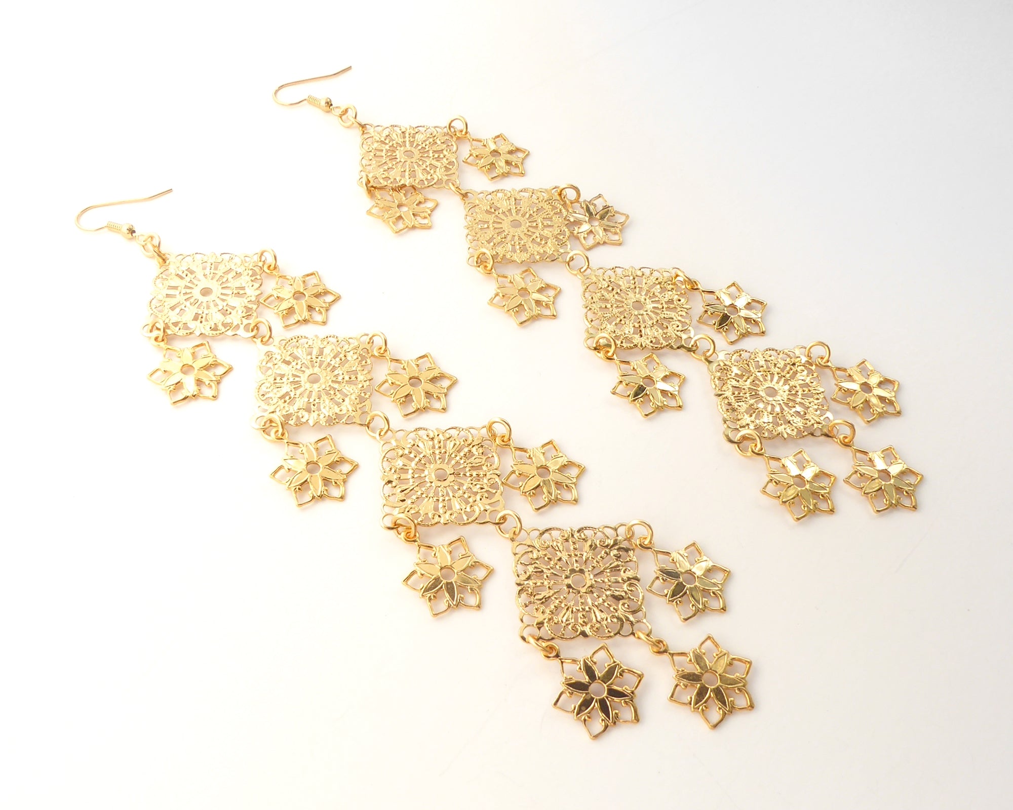 Gold long estrella earrings by Jenny Dayco 2