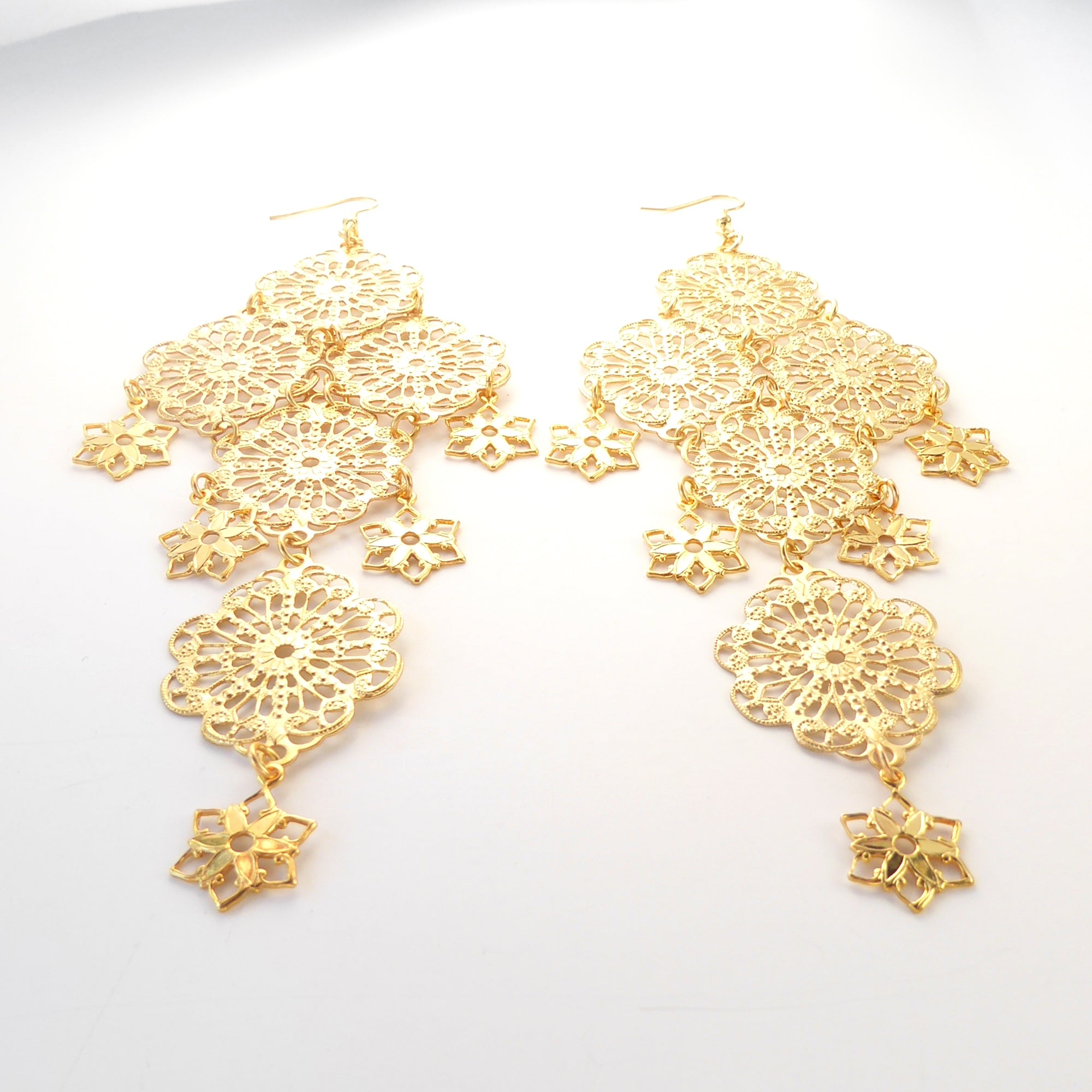 Gold medium estrella earrings by Jenny Dayco 3