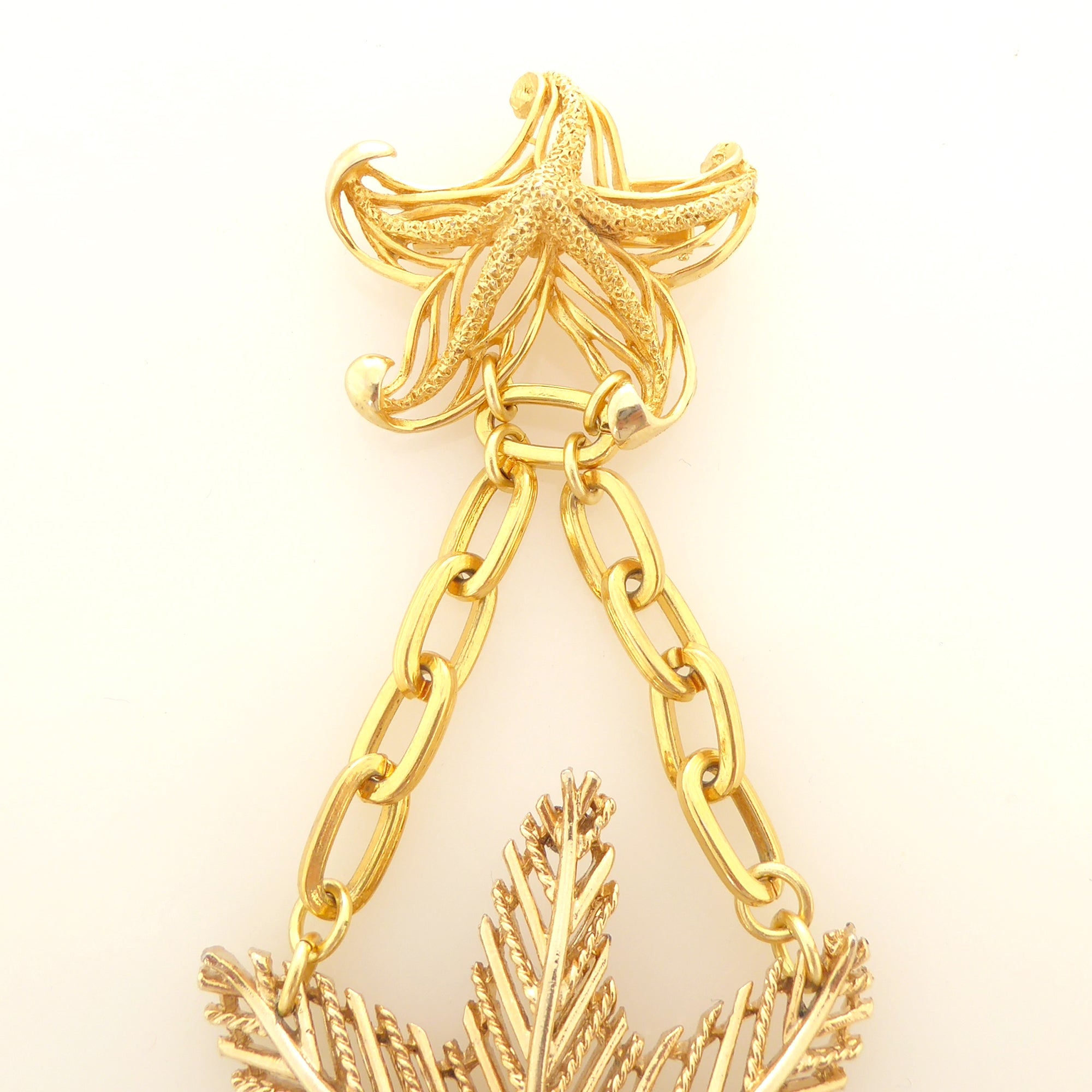 Gold starfish brooch by Jenny Dayco 4