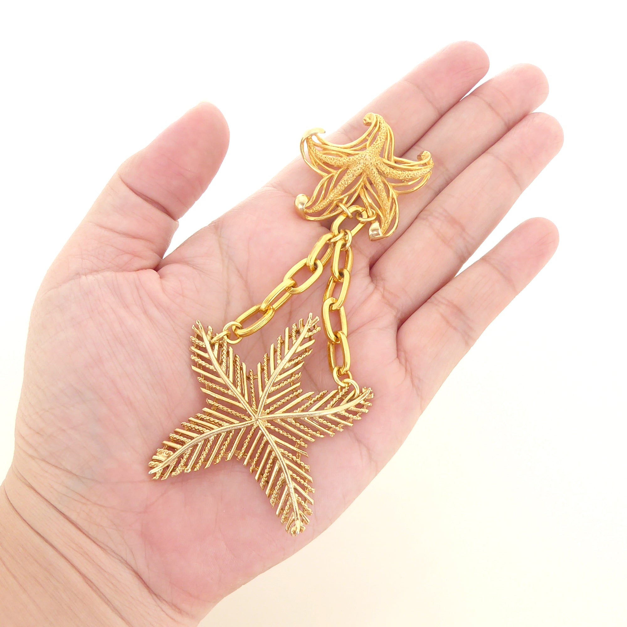 Gold starfish brooch by Jenny Dayco 7