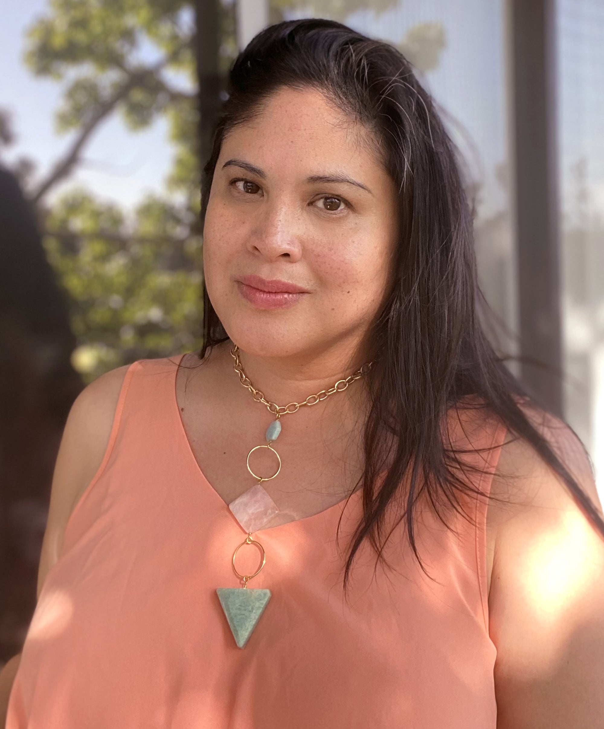 Jenny Dayco wearing a gioia rose quartz and amazonite necklace