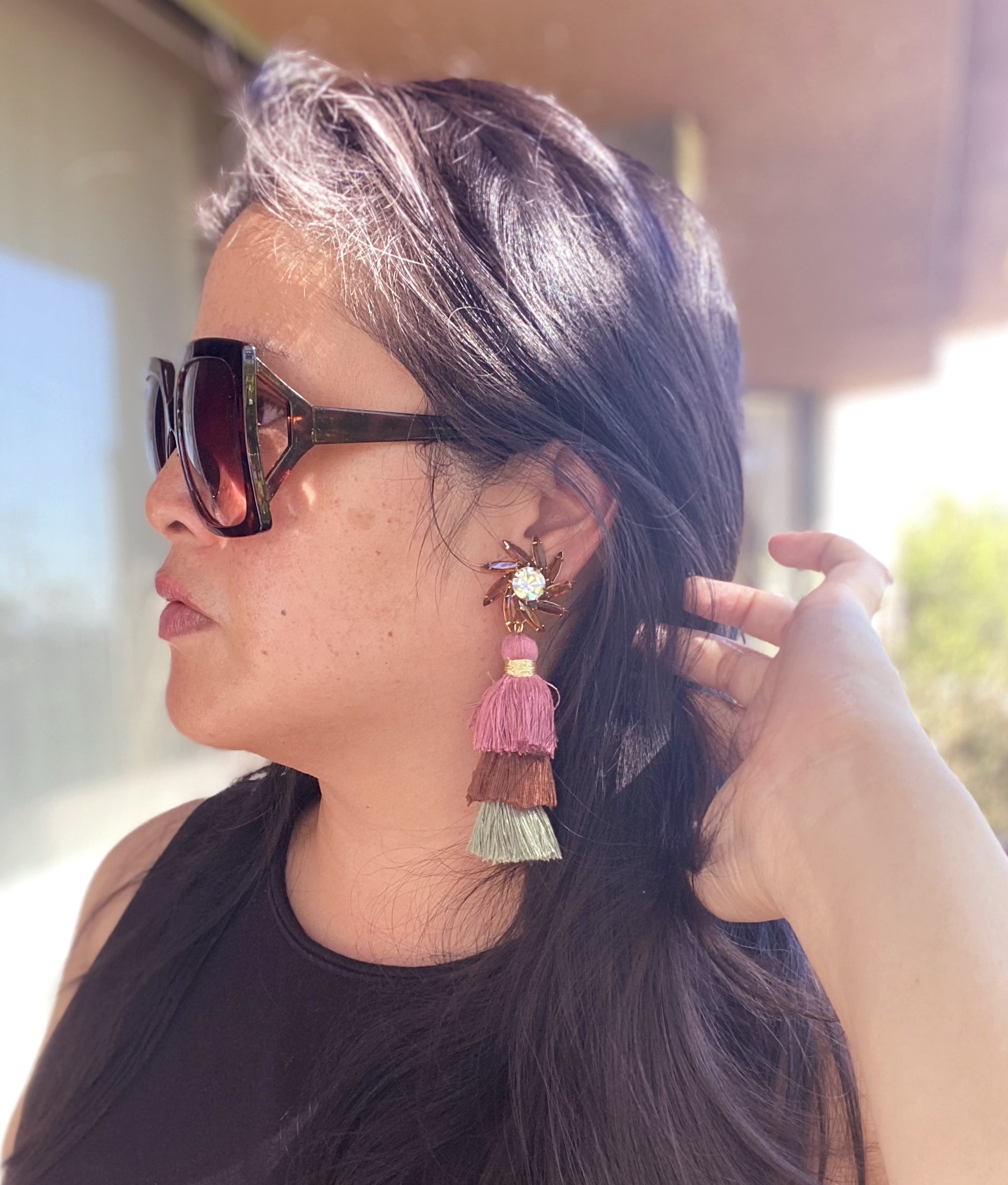 Jenny Dayco wearing autumn tassel earrings