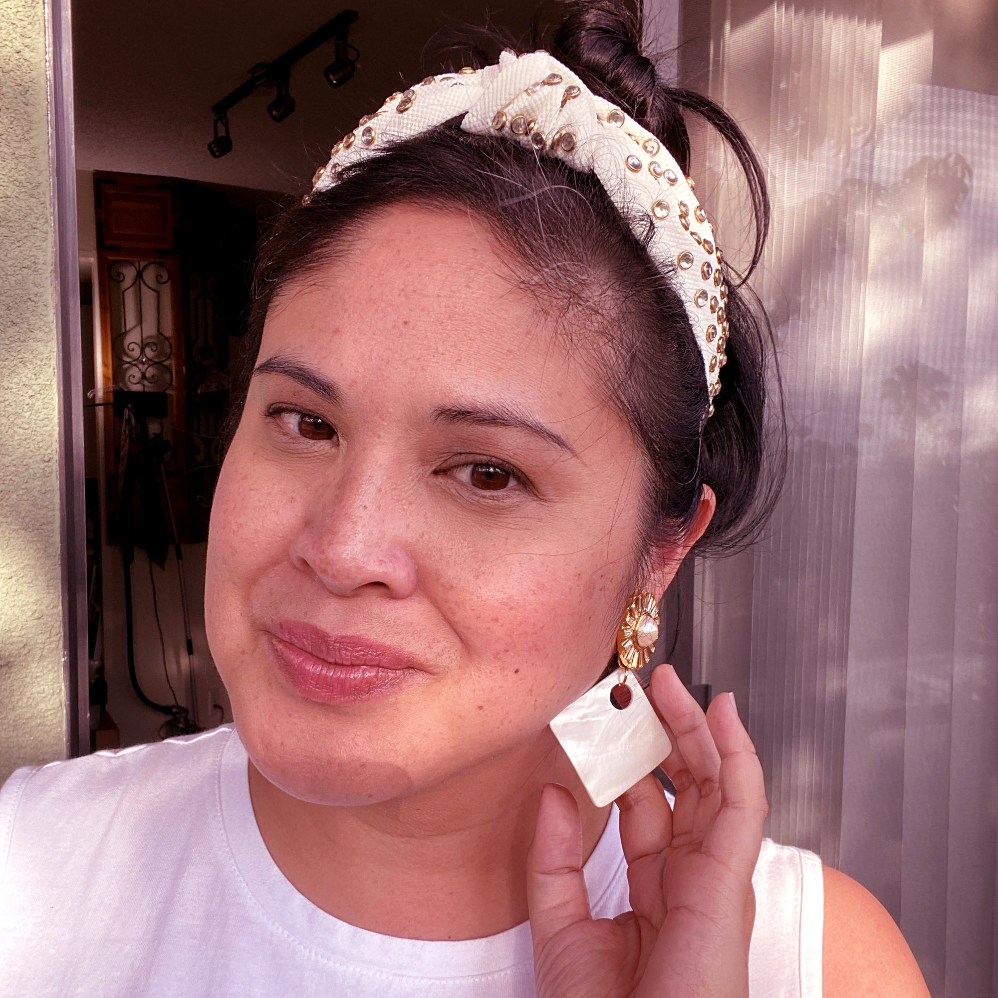 Jenny Dayco wearing celesse earrings