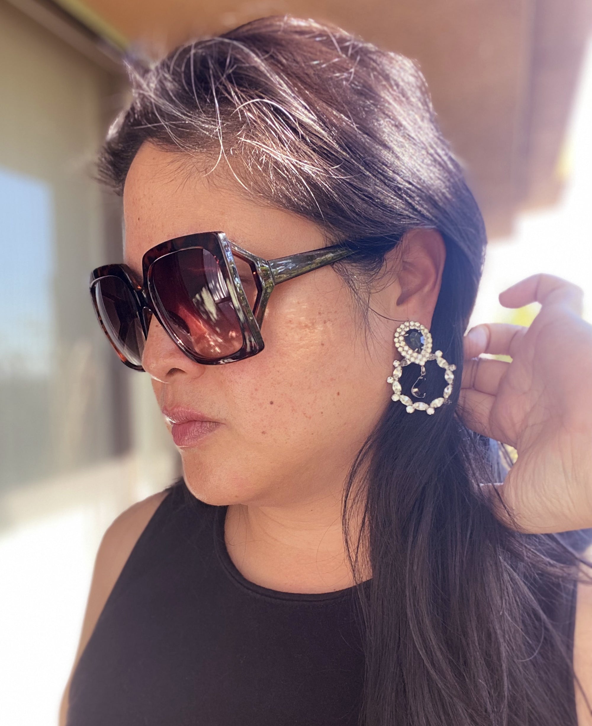 Jenny Dayco wearing selenia rhinestone earrings