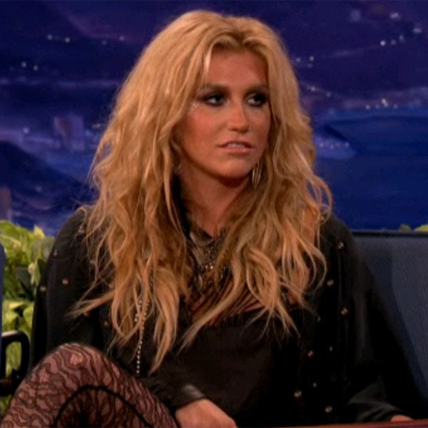 Kesha wearing Jenny Dayco brass okra earrings 2