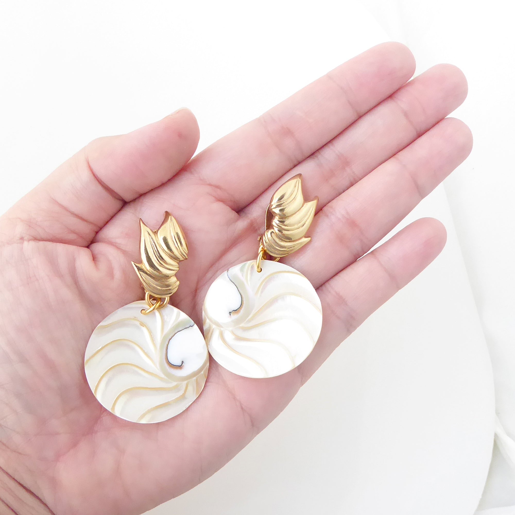 Nautilus chamber earrings by Jenny Dayco 6