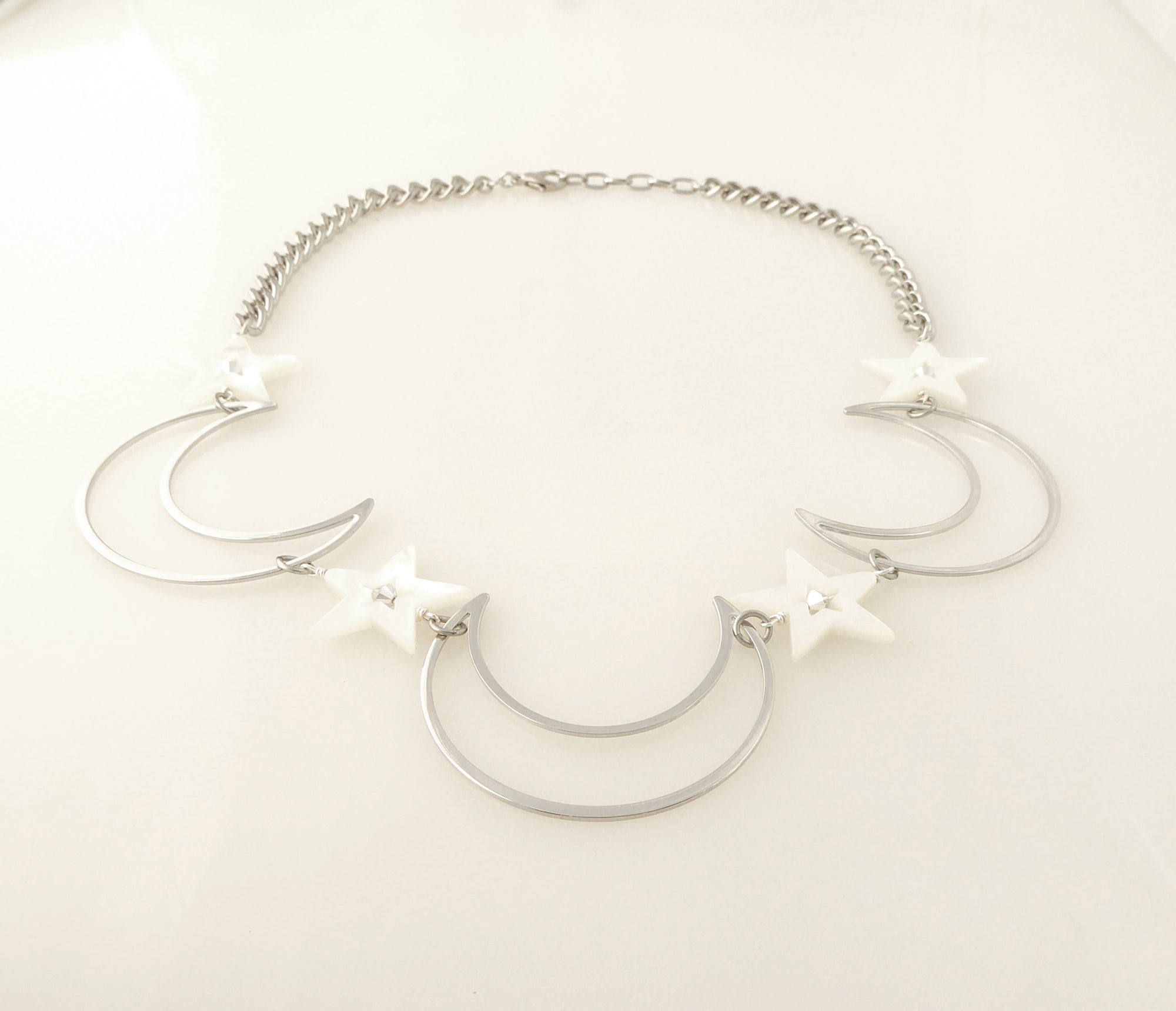 Silver crescent moon necklace by Jenny Dayco 3