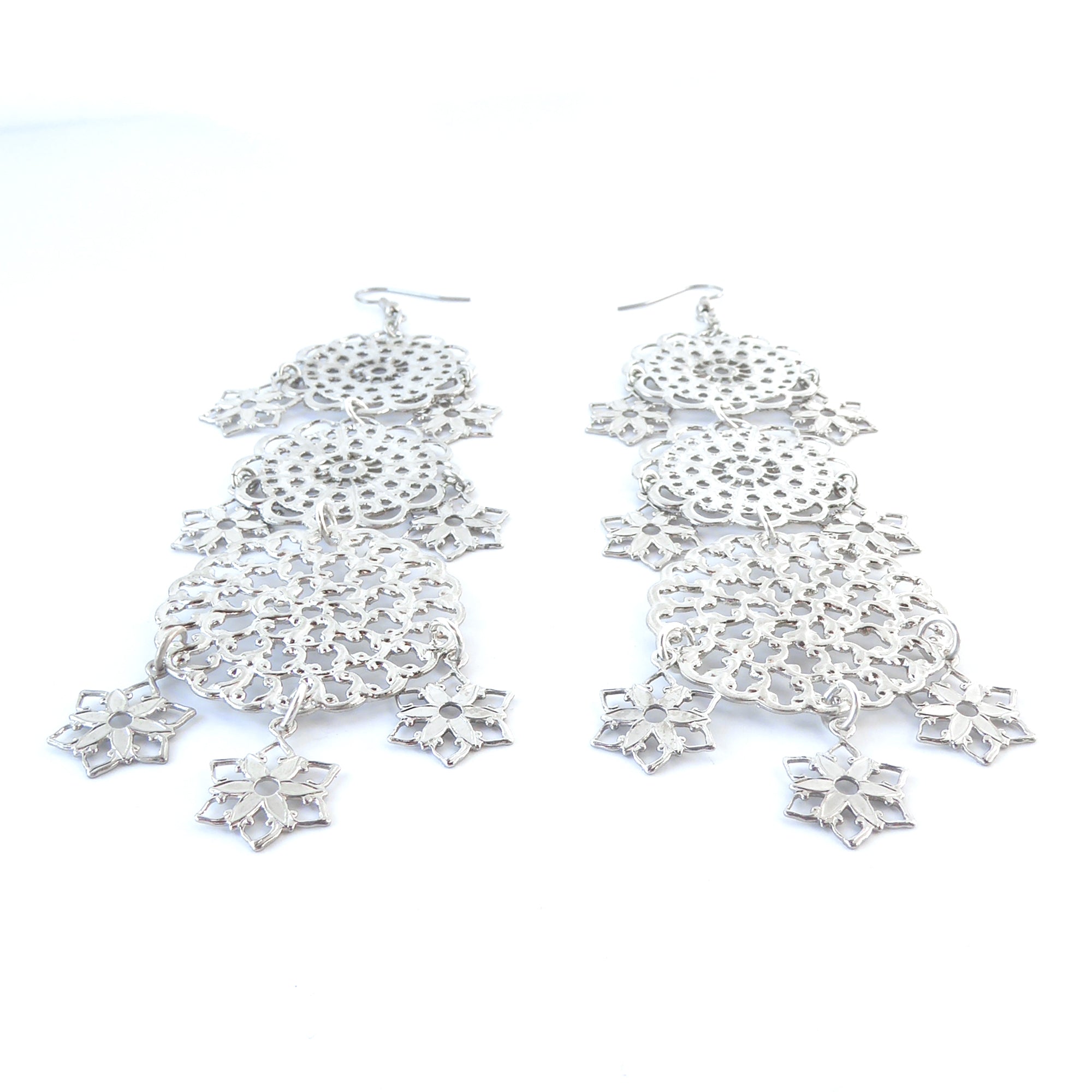 Silver round estrella earrings by Jenny Dayco 3