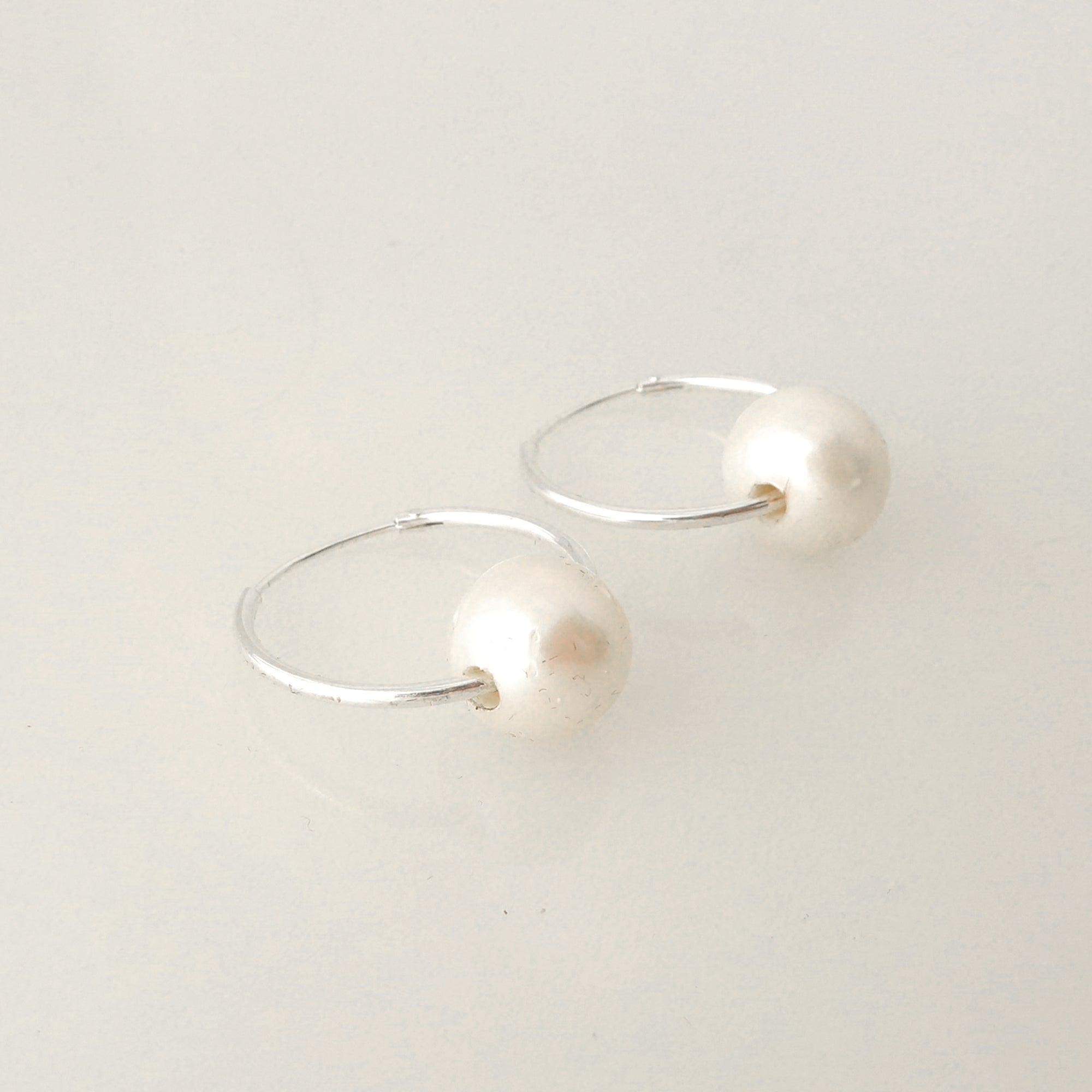 Small sterling silver hoop and pearl earrings by Jenny Dayco 2