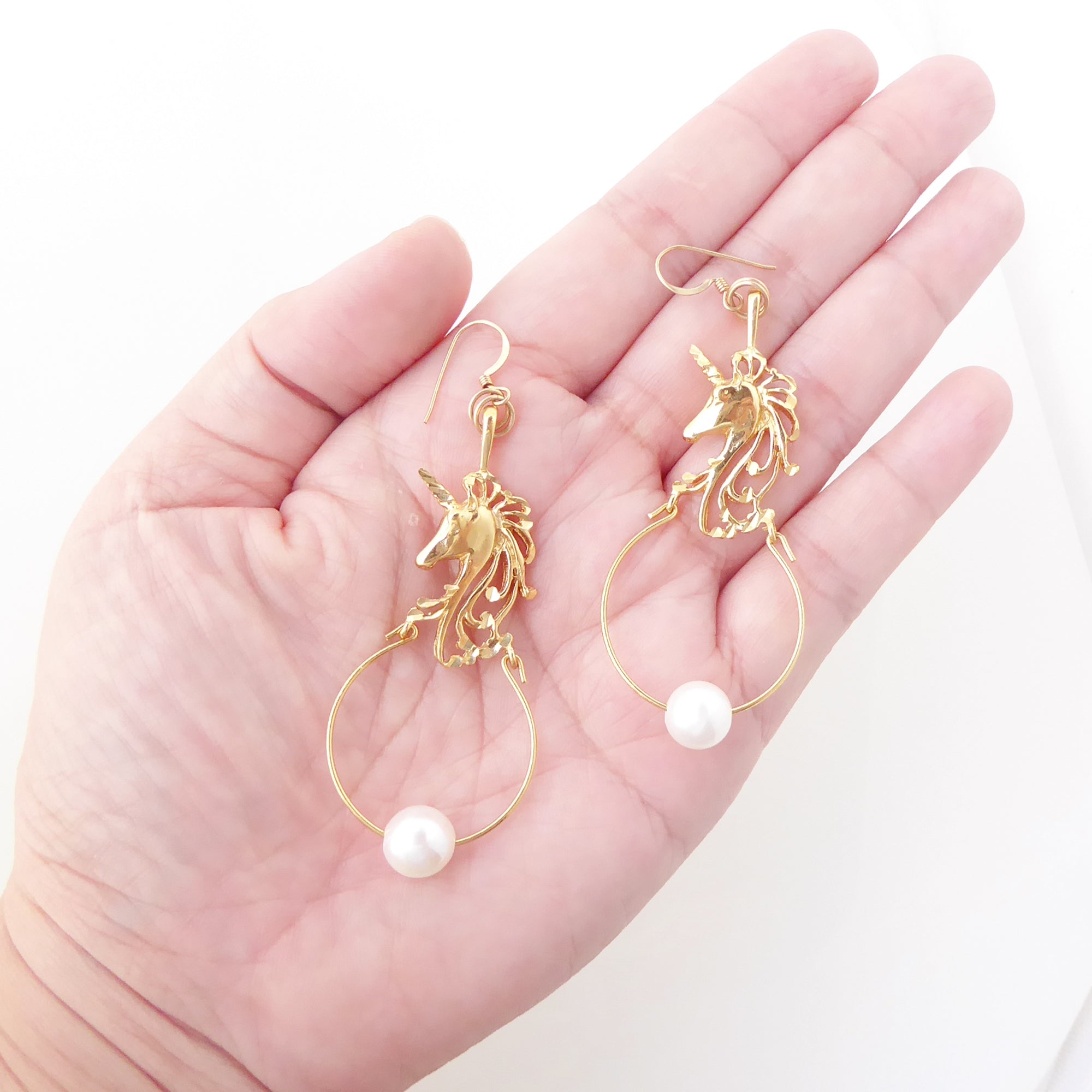 Unicorn pearl earrings by Jenny Dayco 4